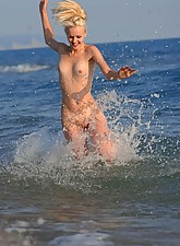 Naked On The Beach photo 3 of 10